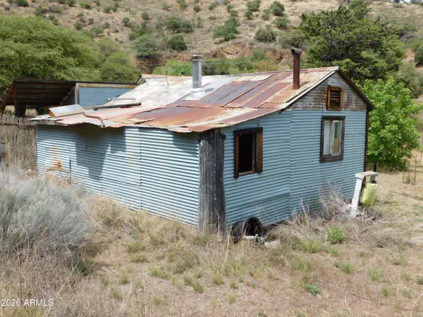 a view of a yard with mountain view