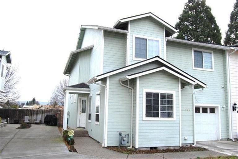 660 Shadow Way Central Point, OR 97502 - Photo 1 of 18 a view of a house with a garage
