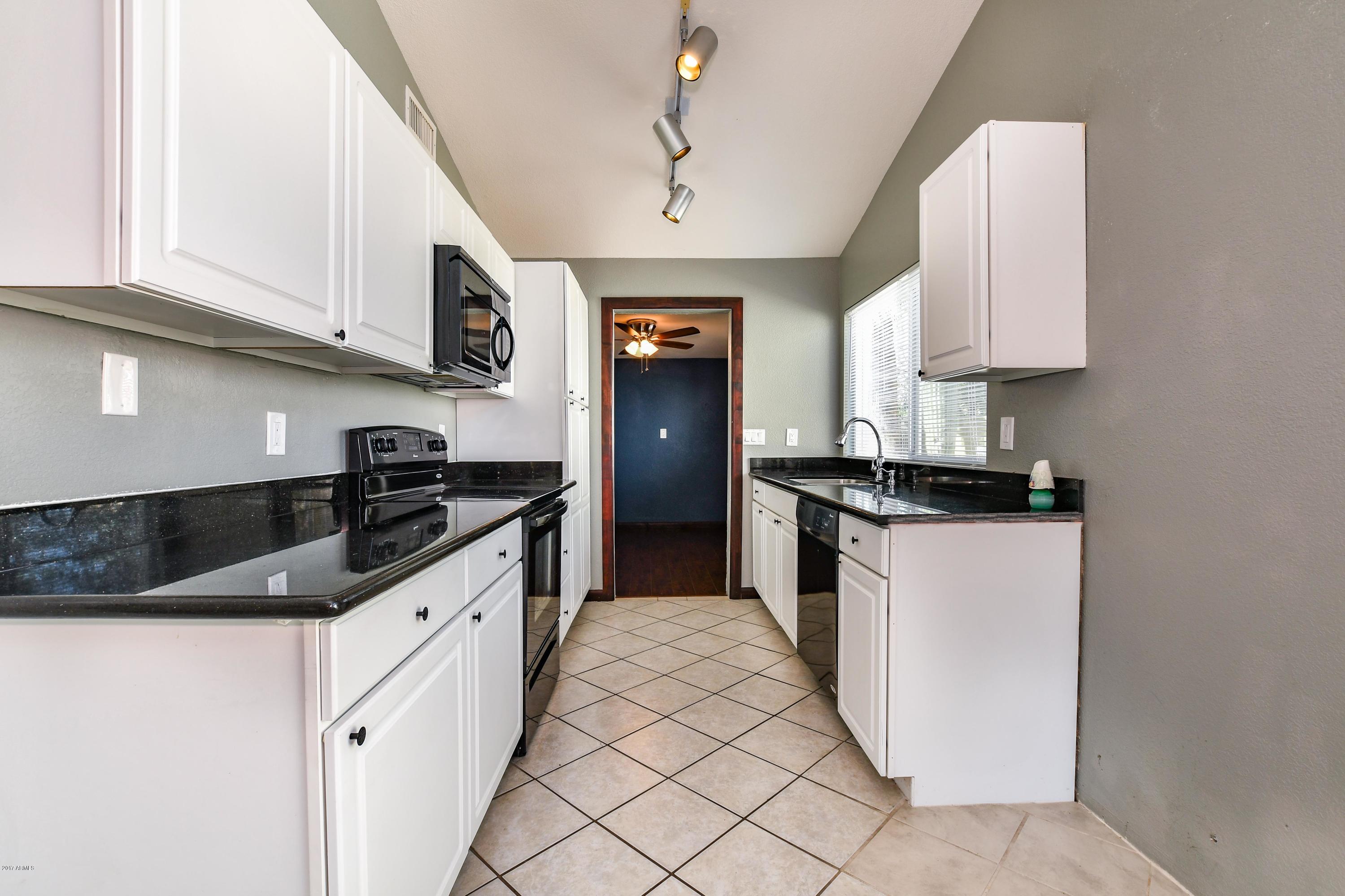 1714 East Darrel Road Phoenix, AZ 85042 - Photo 5 of 14 Darrel kitchen