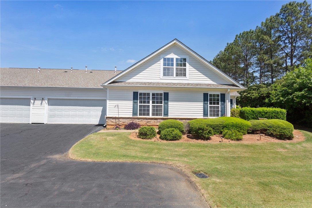 155 Life Style Lane Anderson, SC 29621 - Photo 48 of 49 This charming home offers a well-maintained exterior and a practical driveway, ideal for convenient living.