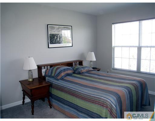 33 Brownstone Road East Windsor, NJ 08520 - Photo 14 of 20 a bedroom with bed and a window