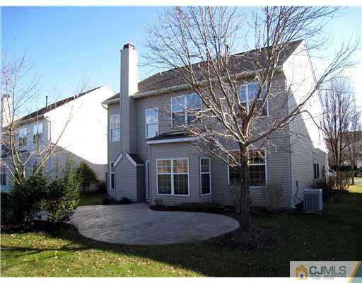 33 Brownstone Road East Windsor, NJ 08520 - Photo 20 of 20 a view of house with a yard
