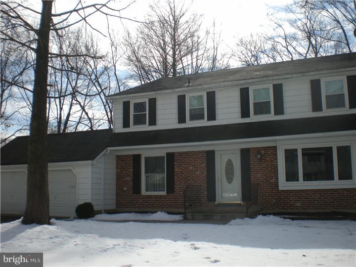4 Ramsgate Road Cherry Hill, NJ 08003 - Photo 3 of 24 a front view of a house with a yard