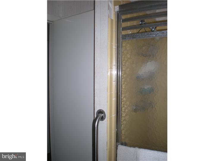 4 Ramsgate Road Cherry Hill, NJ 08003 - Photo 22 of 24 a bathroom with a glass shower door