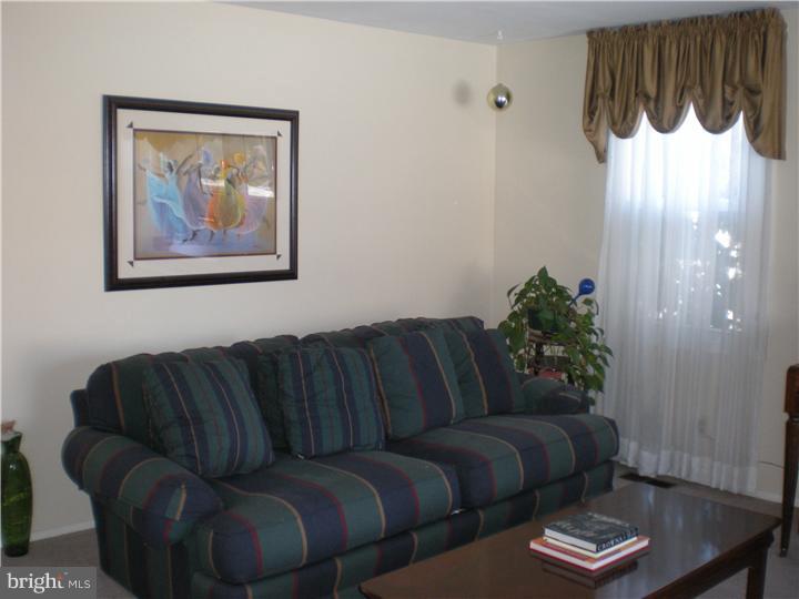 4 Ramsgate Road Cherry Hill, NJ 08003 - Photo 9 of 24 a living room with furniture and a potted plant
