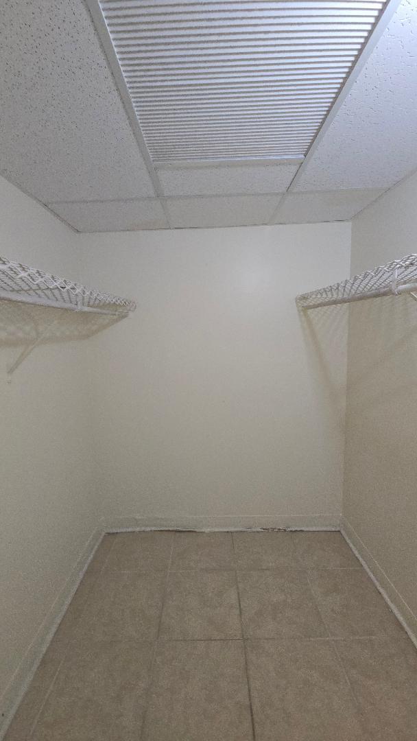 4403 Treehouse Lane, Unit H Tamarac, FL 33319 - Photo 19 of 26 a view of a room