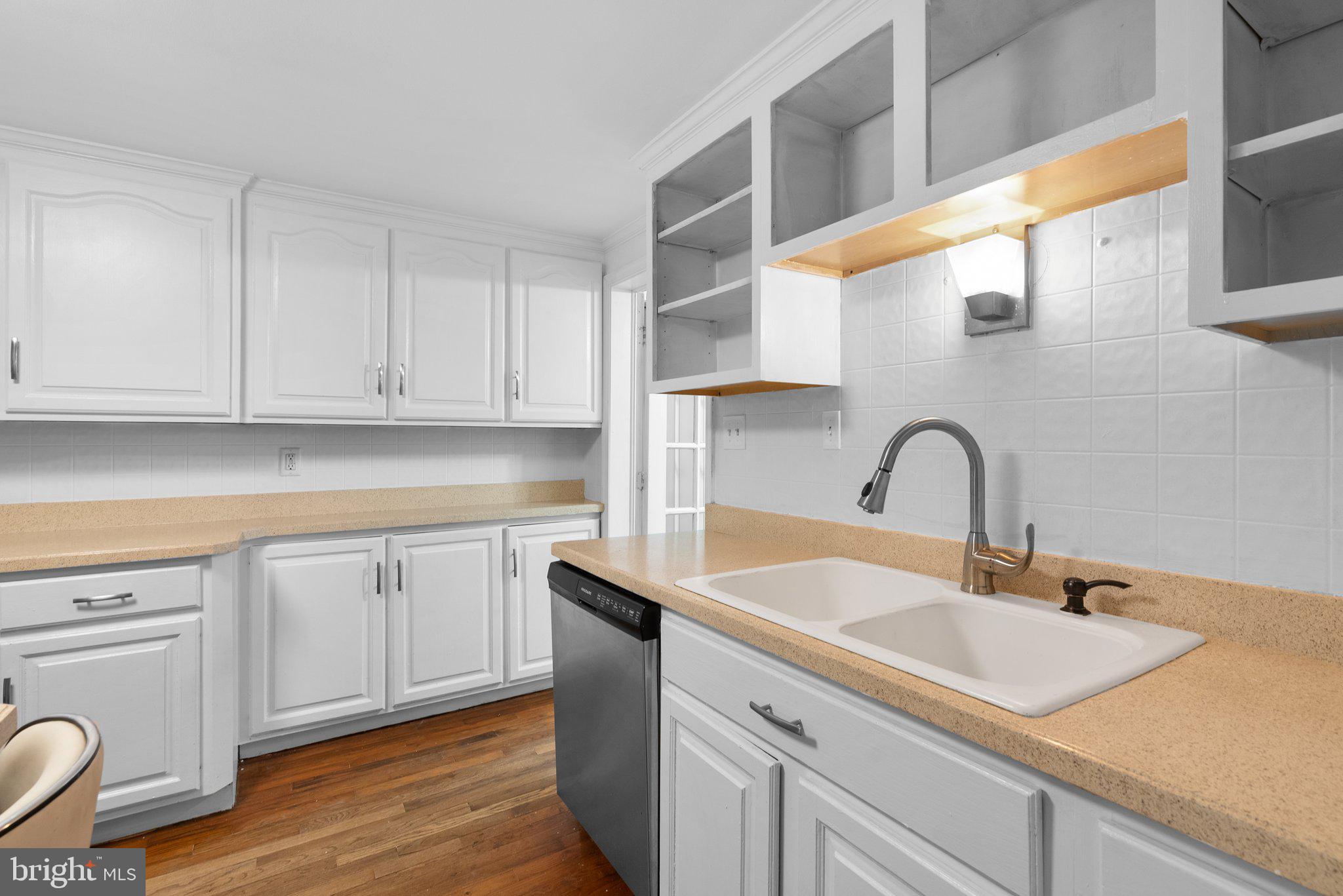 810 Knoxville Road Knoxville, MD 21758 - Photo 19 of 42 a kitchen with sink and cabinets