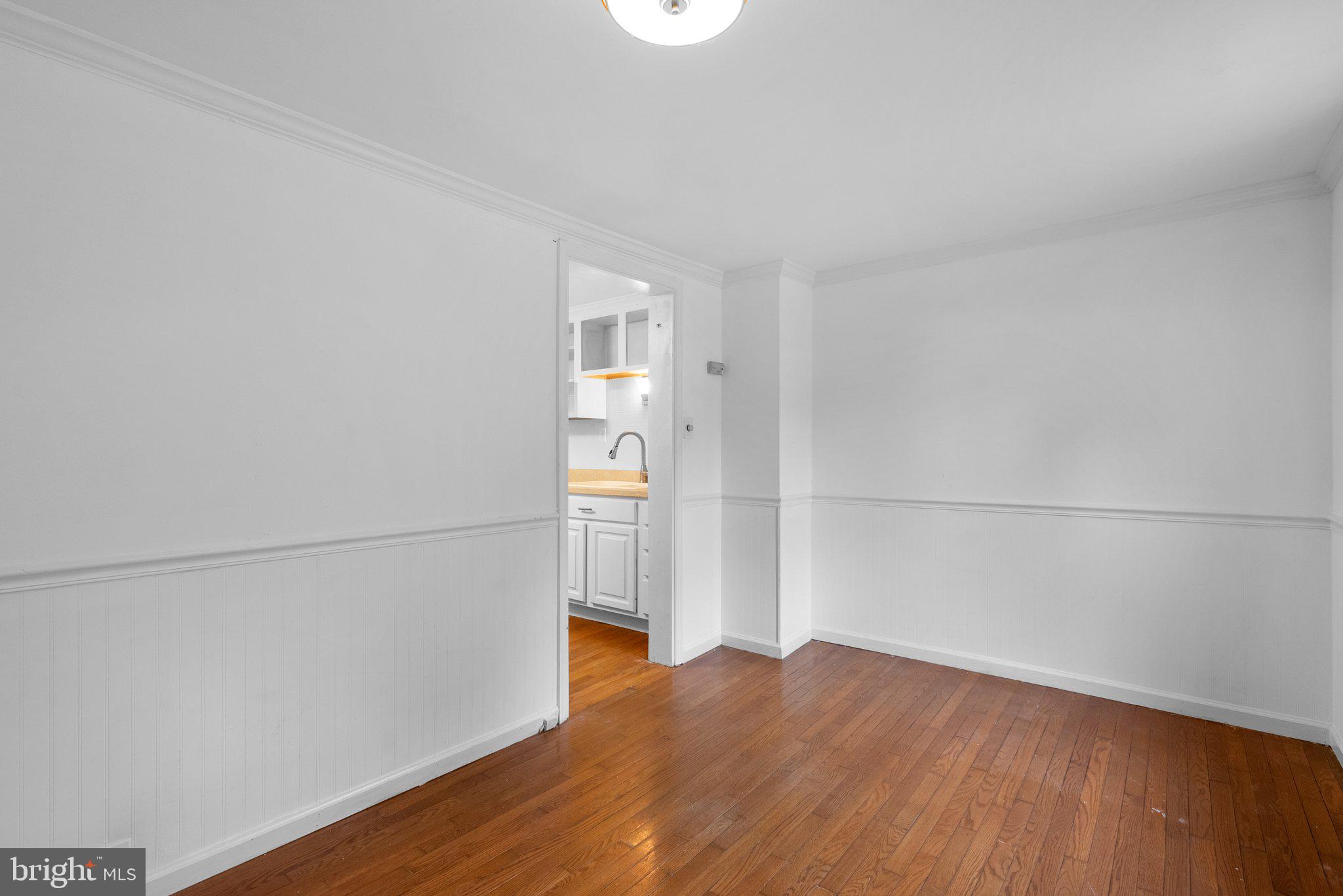 810 Knoxville Road Knoxville, MD 21758 - Photo 21 of 42 a view of empty room with wooden floor