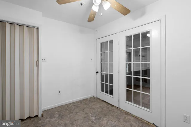 an empty room with windows