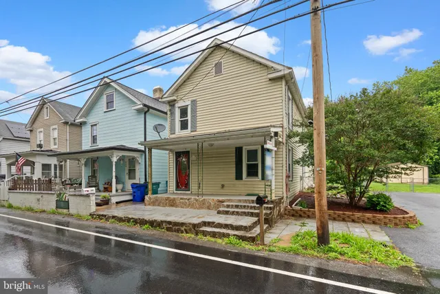 a front view of a house with porch
