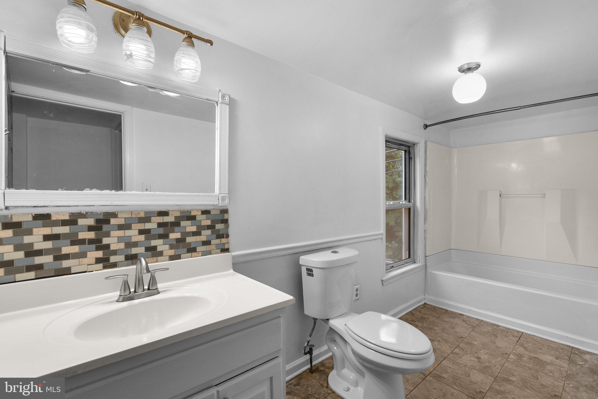 810 Knoxville Road Knoxville, MD 21758 - Photo 36 of 42 a bathroom with a sink a toilet and shower