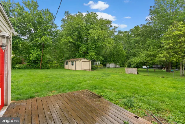 a view of a backyard with a garden