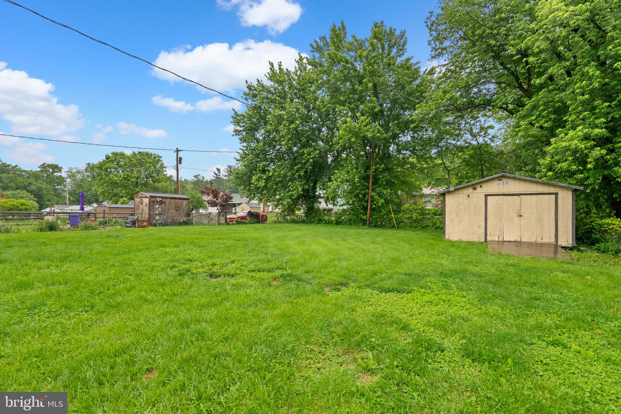 810 Knoxville Road Knoxville, MD 21758 - Photo 7 of 42 a view of yard with swimming pool and green space
