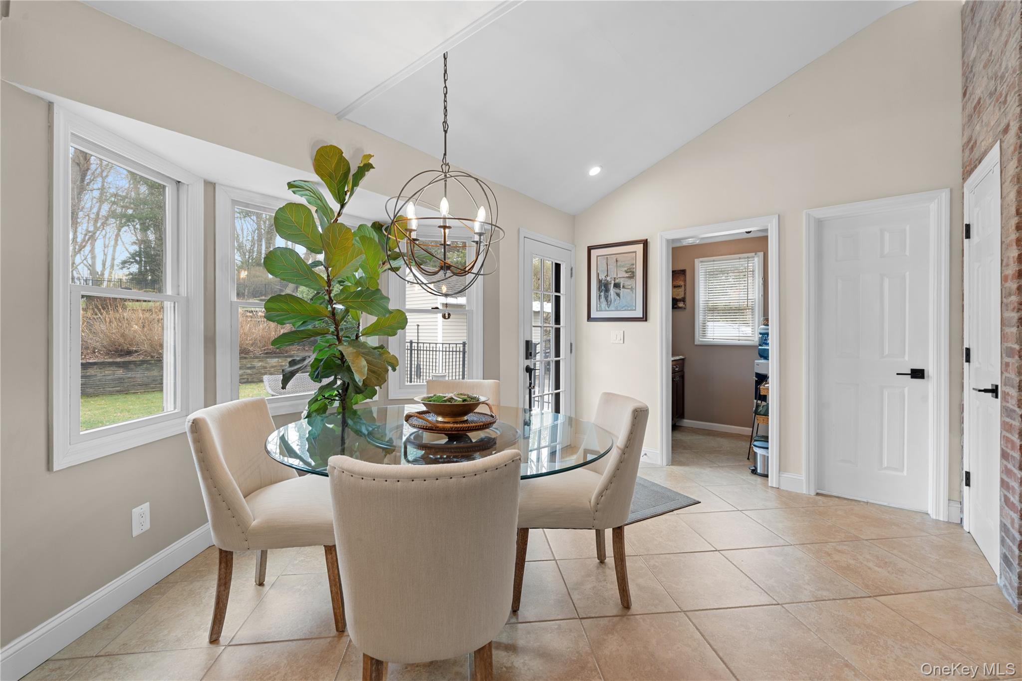 29 Dyke Road Setauket, NY 11733 - Photo 18 of 44 a dining room filled with furniture and window