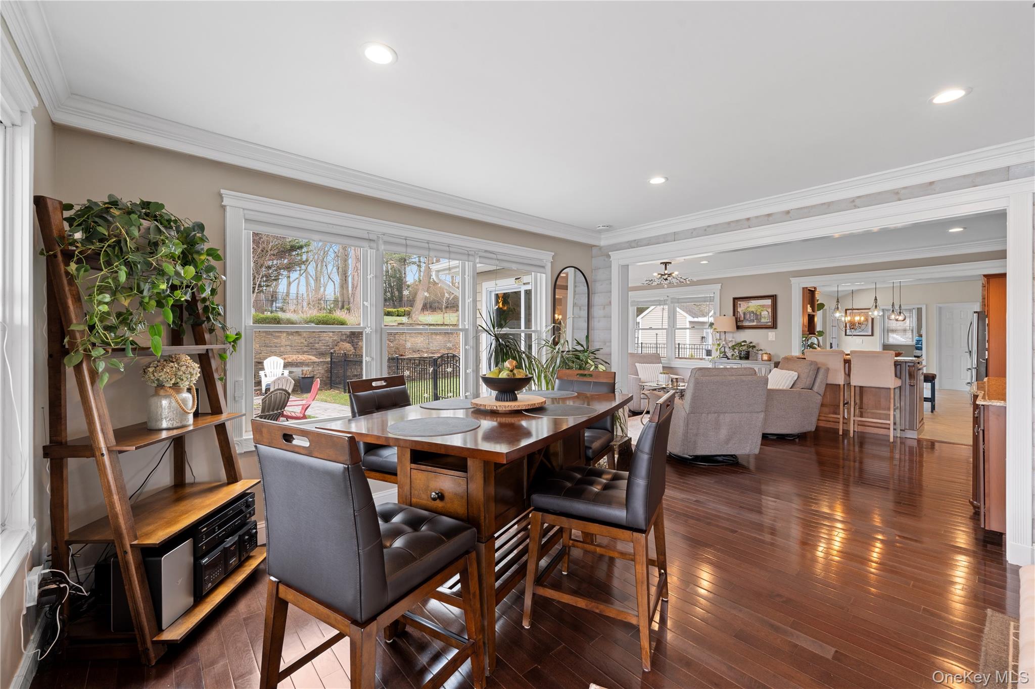 29 Dyke Road Setauket, NY 11733 - Photo 20 of 44 a view of a dining room with furniture window and wooden floor
