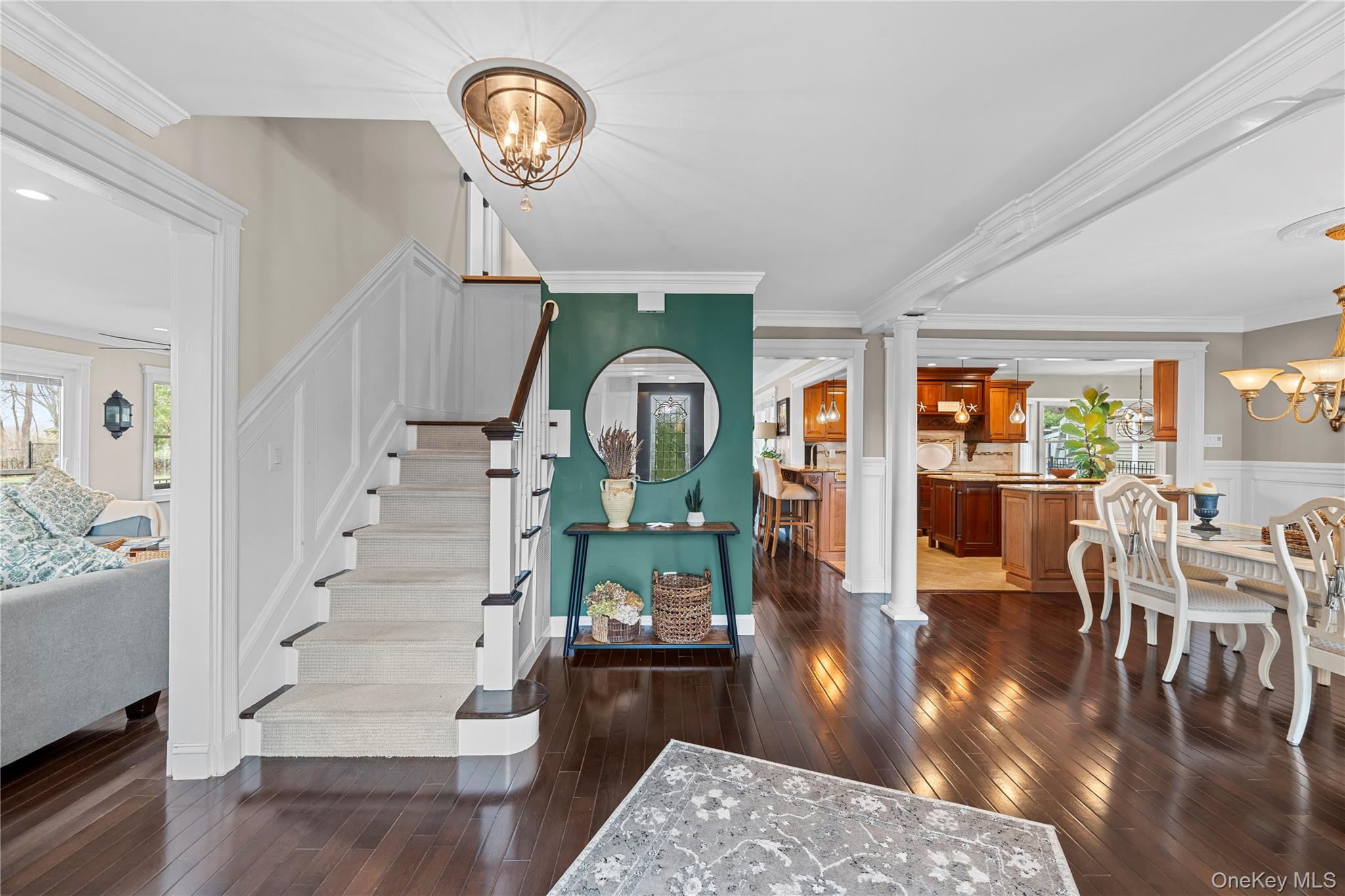 29 Dyke Road Setauket, NY 11733 - Photo 23 of 44 a view of living room and dining room with wooden floor