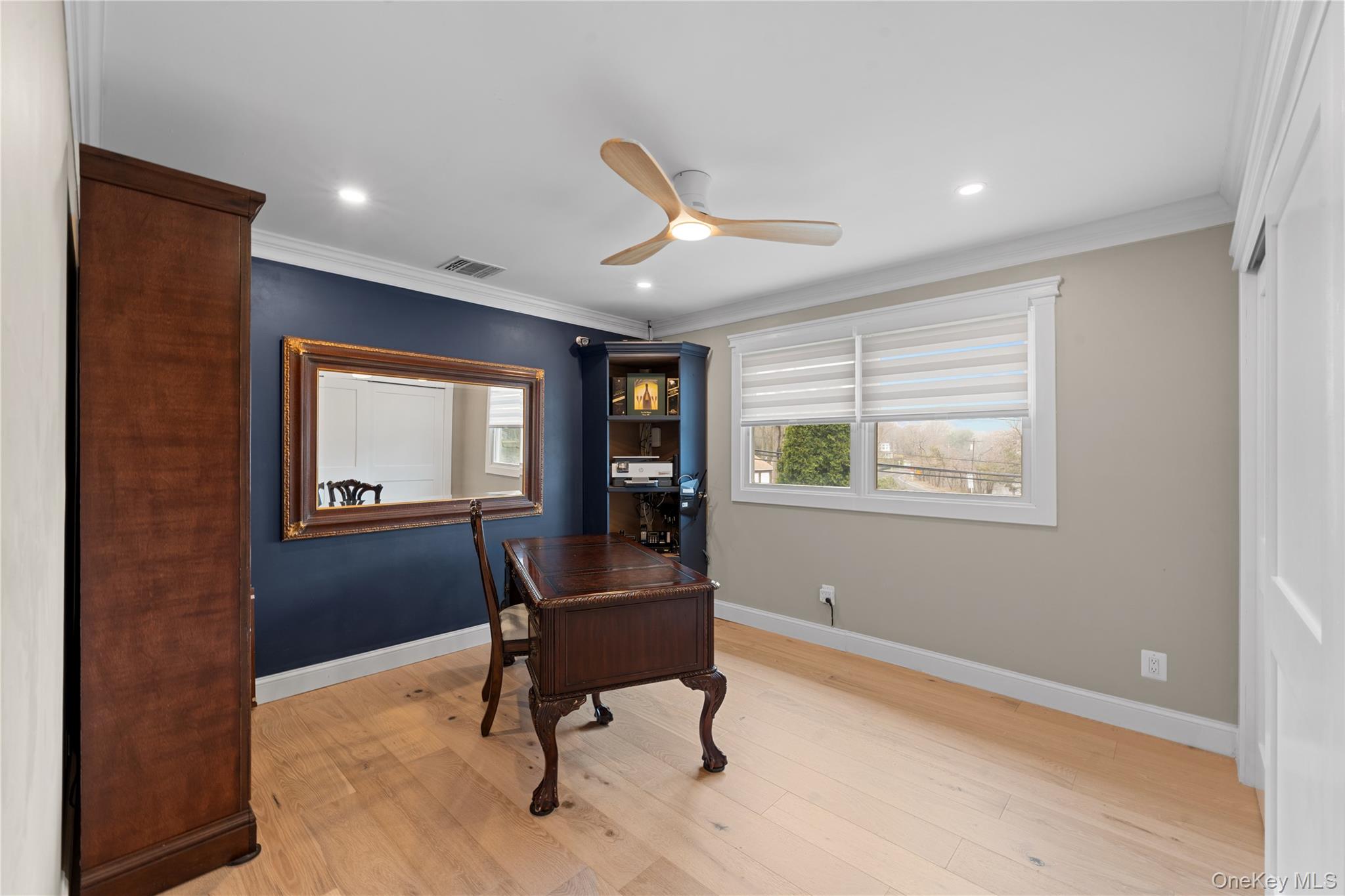 29 Dyke Road Setauket, NY 11733 - Photo 26 of 44 a workspace with wooden floor and a window