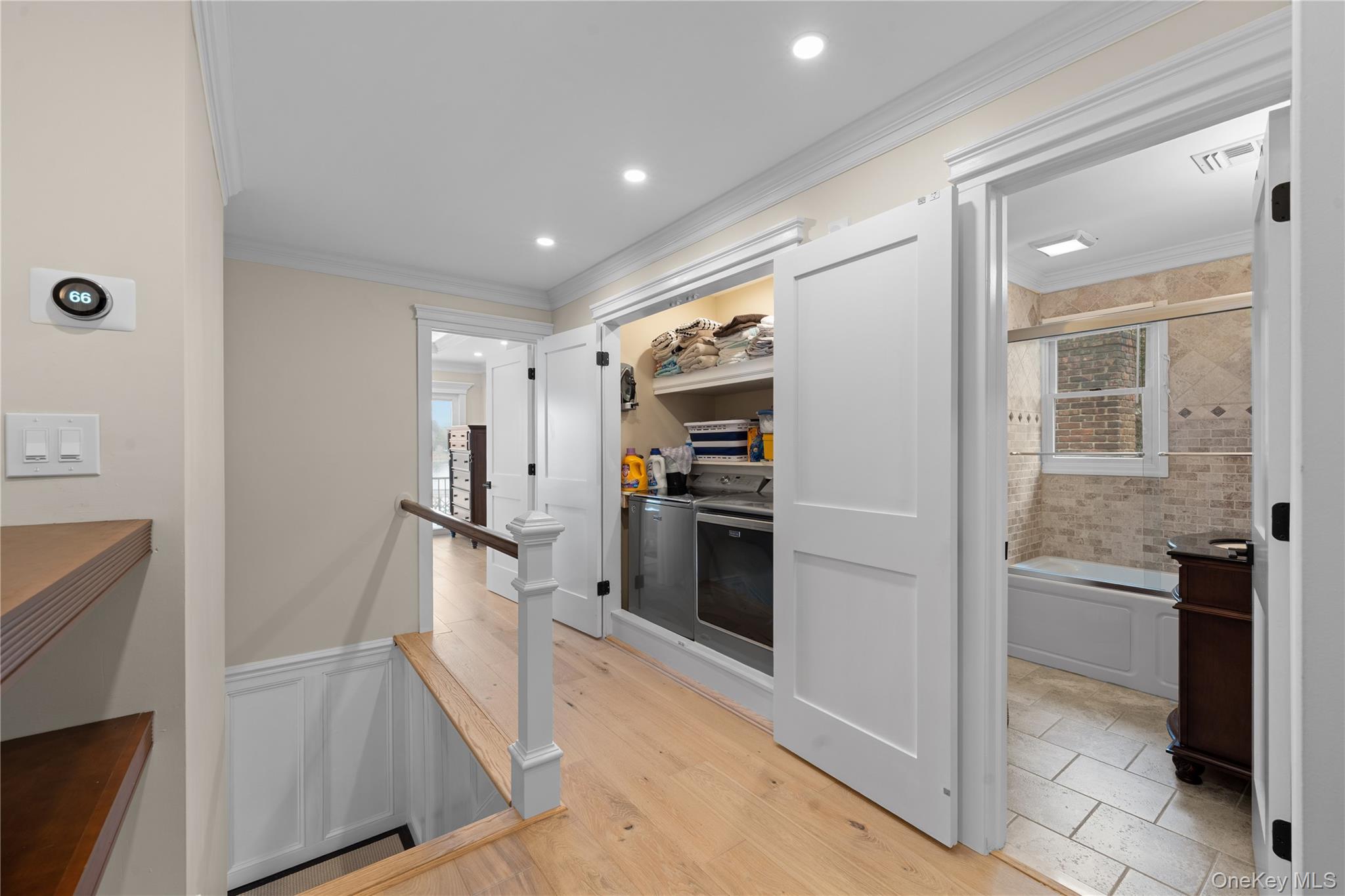 29 Dyke Road Setauket, NY 11733 - Photo 27 of 44 a kitchen with a refrigerator and a stove