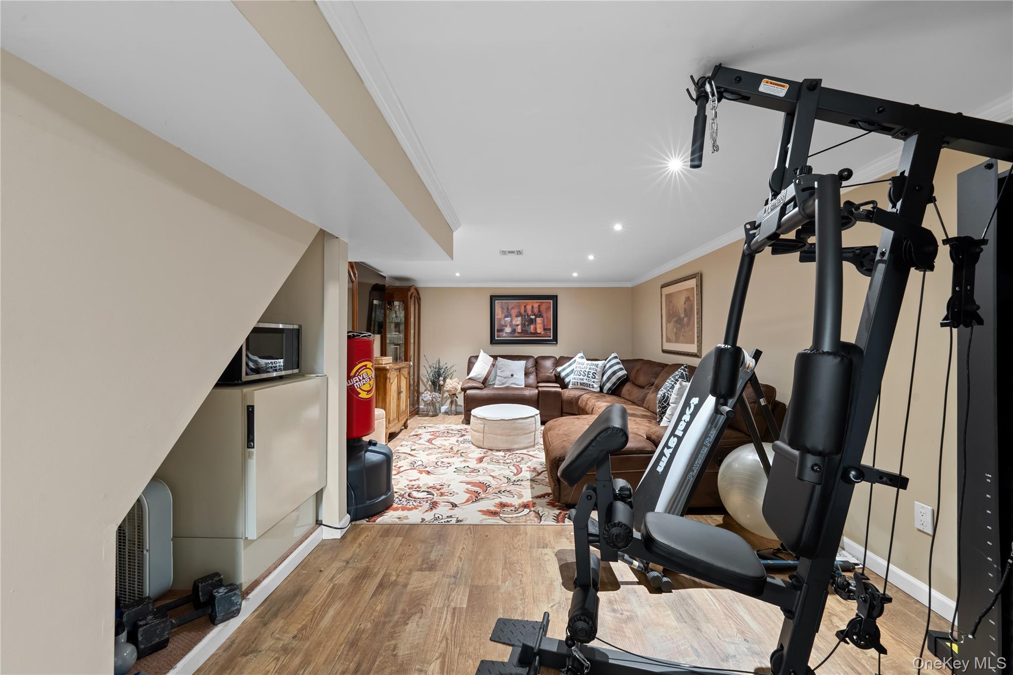 29 Dyke Road Setauket, NY 11733 - Photo 33 of 44 a view of a room with gym equipment