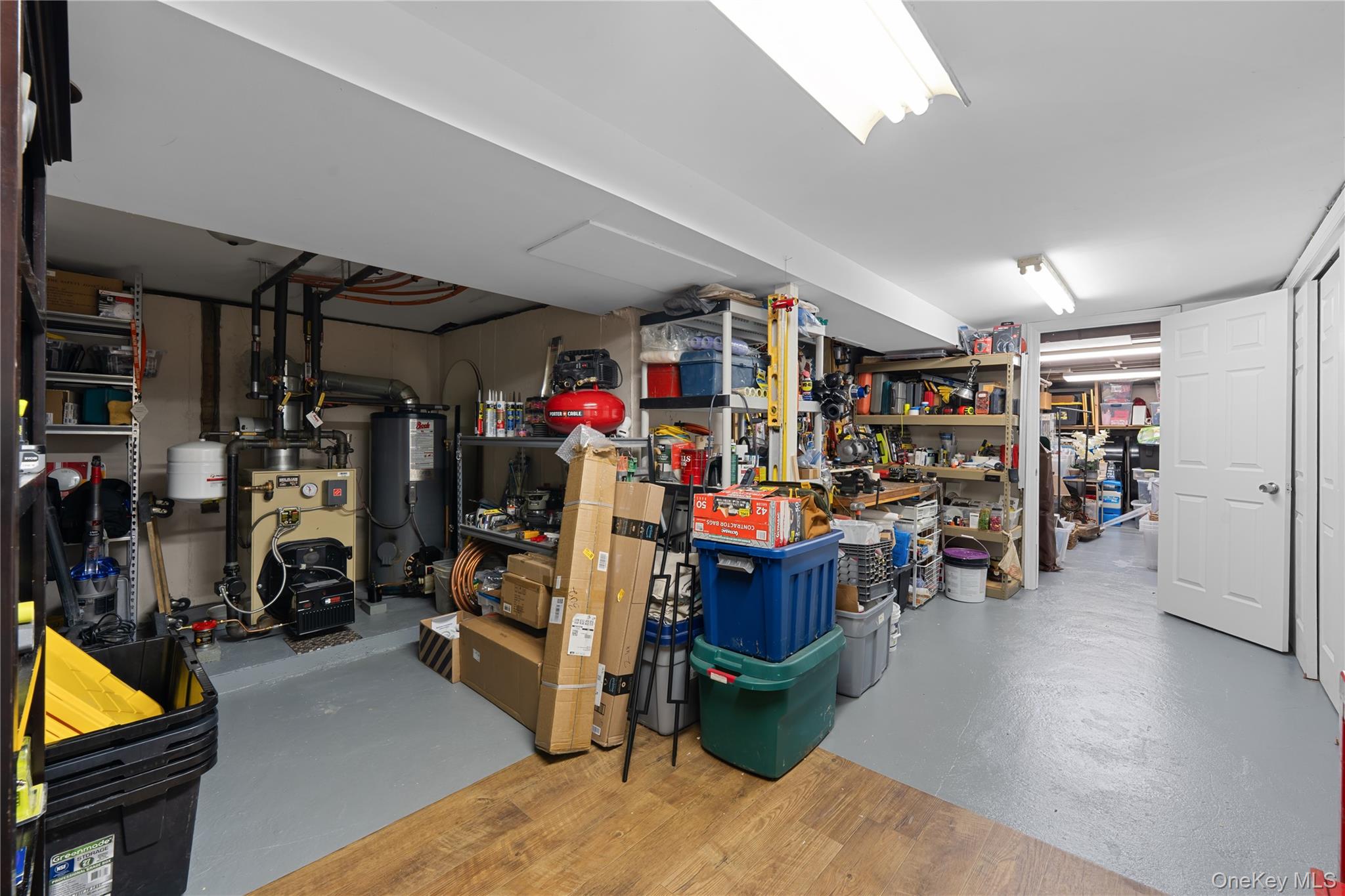 29 Dyke Road Setauket, NY 11733 - Photo 35 of 44 a view of a storage area with racks