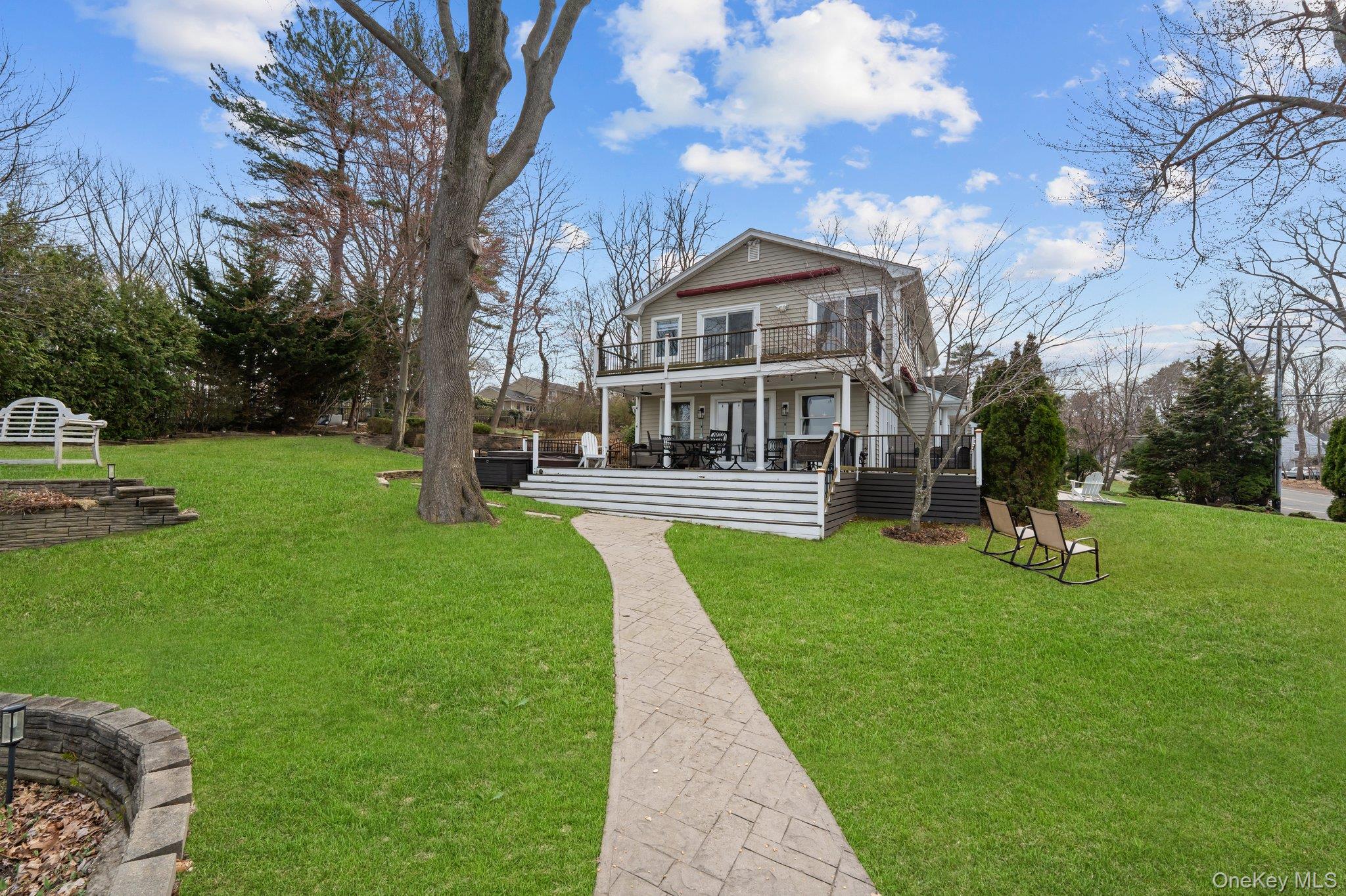 29 Dyke Road Setauket, NY 11733 - Photo 37 of 44 a view of a house with a yard