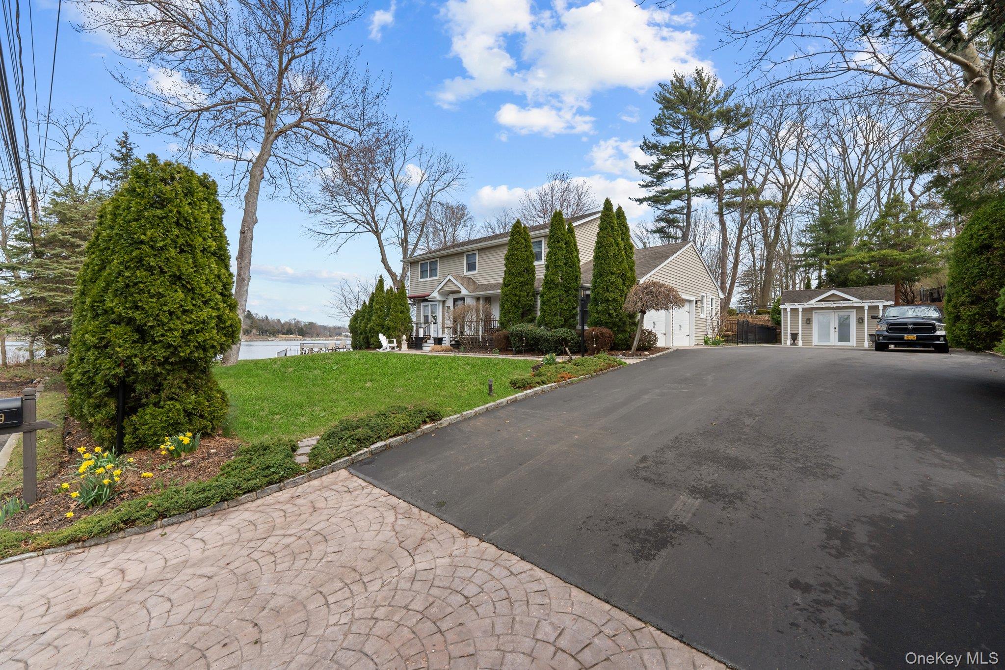 29 Dyke Road Setauket, NY 11733 - Photo 40 of 44 a view of a street with a building in the background