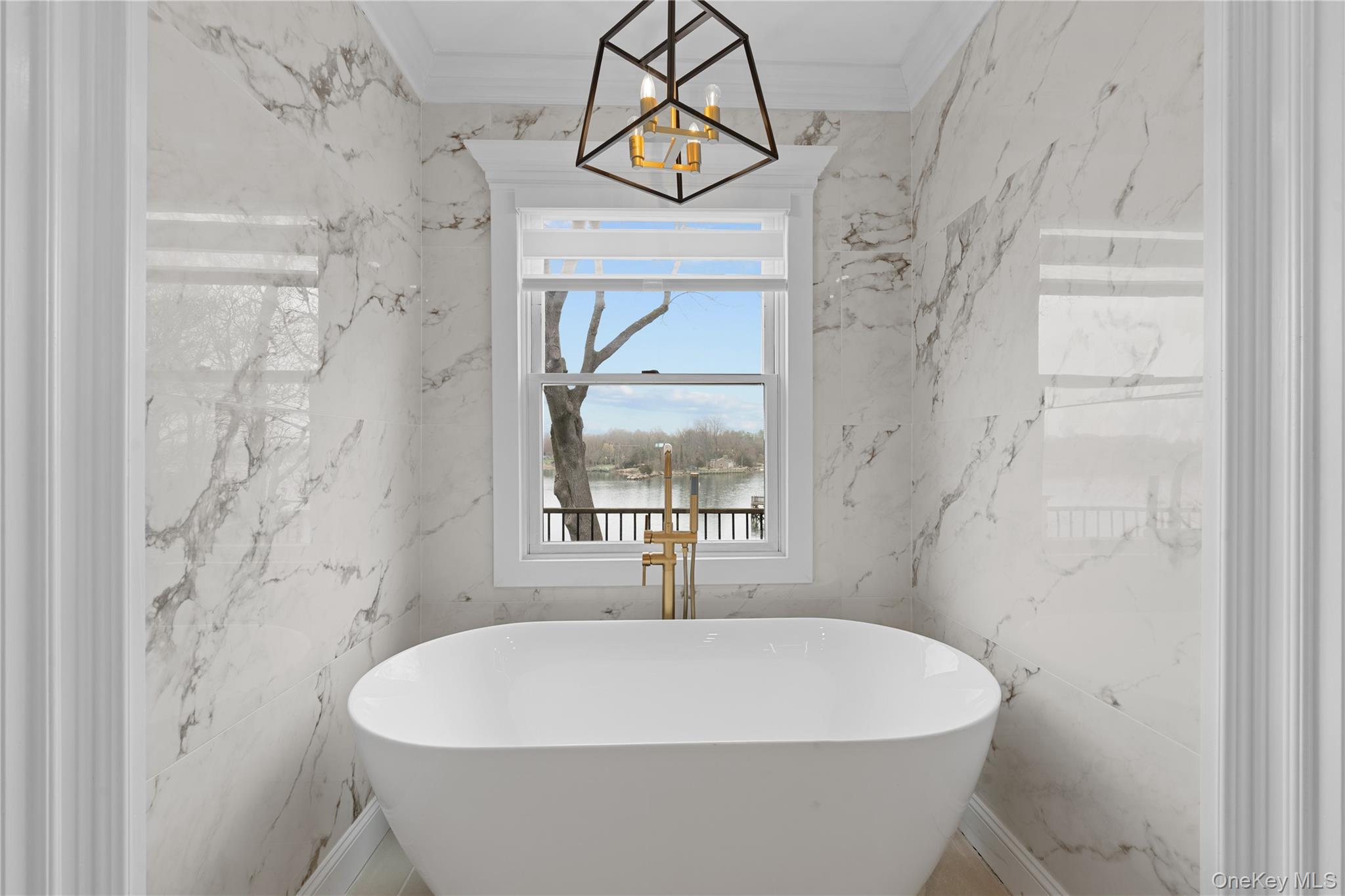 29 Dyke Road Setauket, NY 11733 - Photo 7 of 44 a white bath tub sitting next to a shower