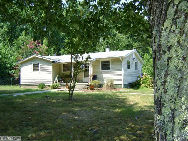 6727 Sandylea Road Oak Ridge, NC 27310 - Photo 1 of 12 Exterior Front.