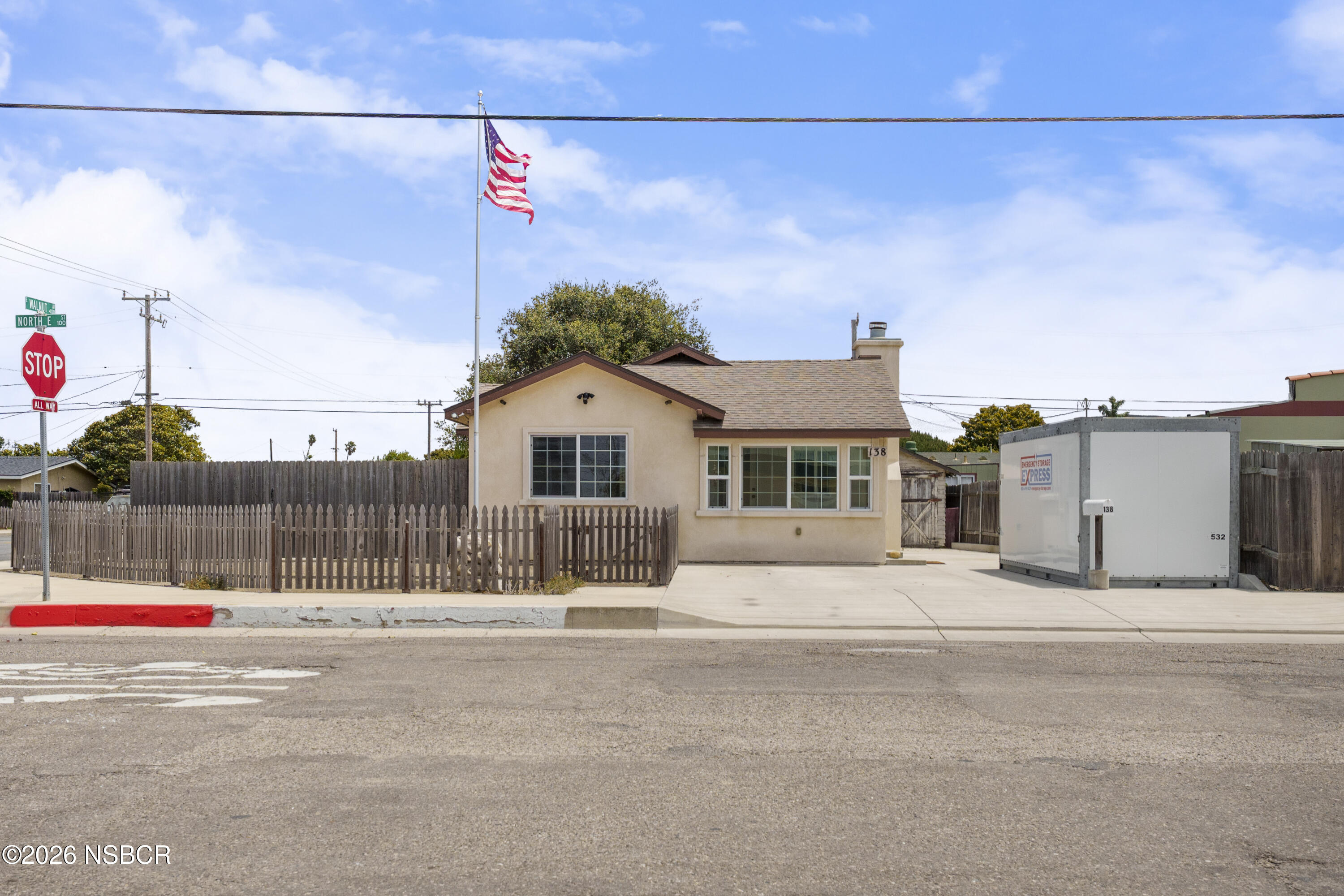 138 North E Street Lompoc, CA 93436 - Photo 1 of 35 a view of street along with houses