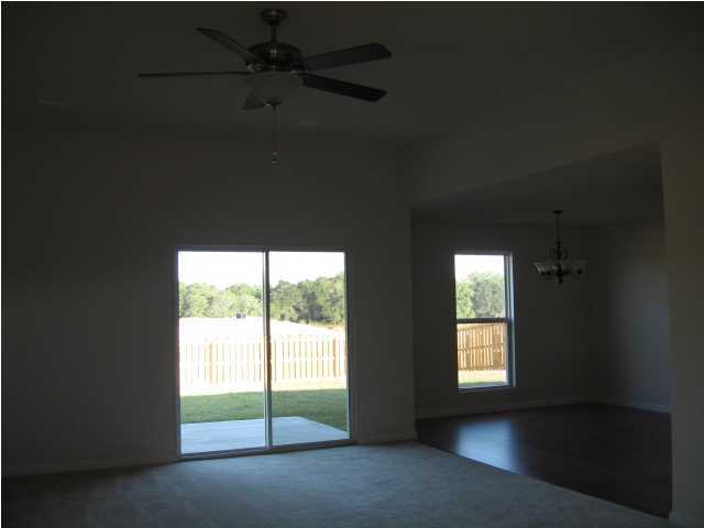 5225 Moore Loop Crestview, FL 32536 - Photo 3 of 9 a view of an empty room with a window