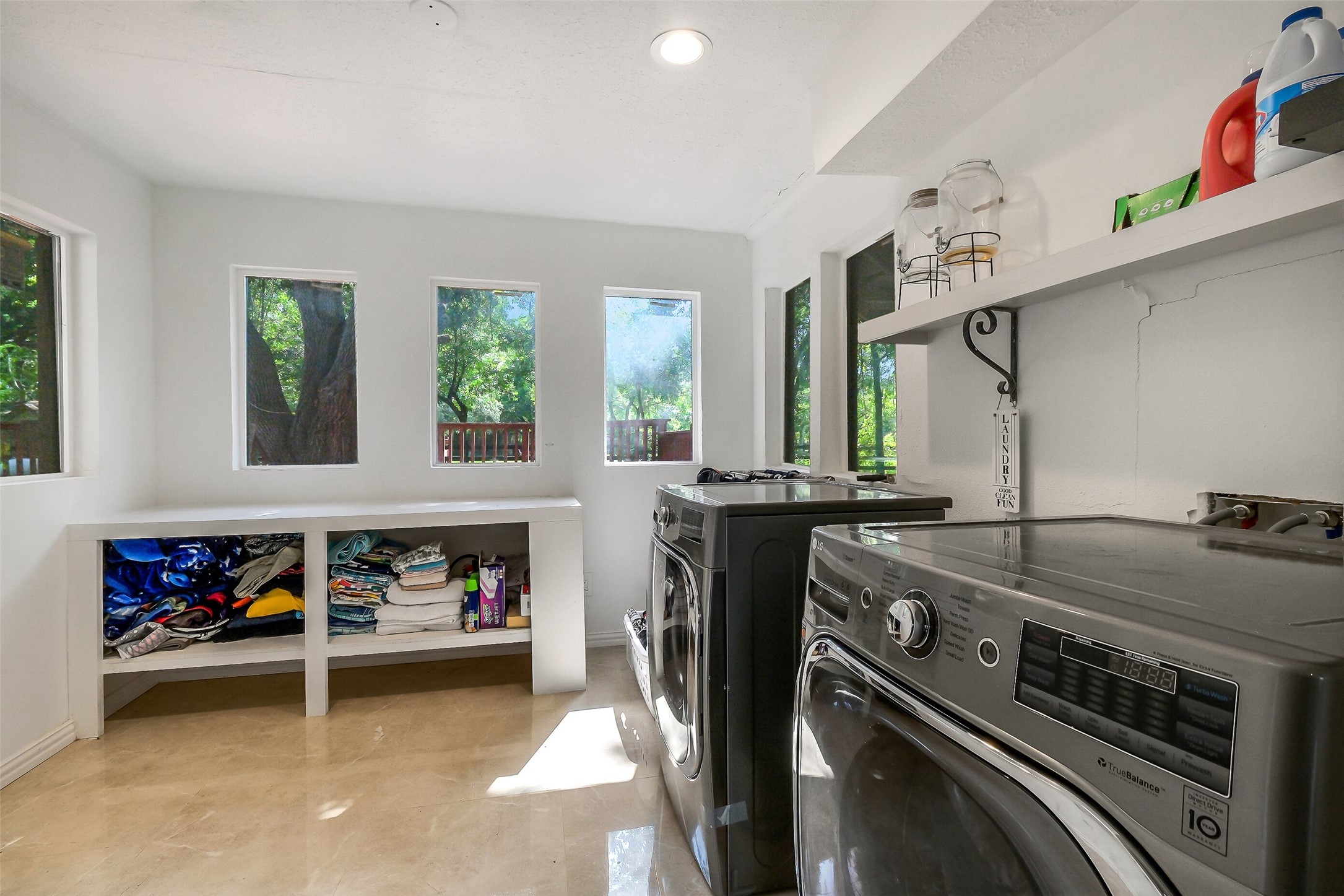1347 Seidel Road Brookshire, TX 77423 - Photo 17 of 50 The laundry is a good size and plenty of folding space and storage.