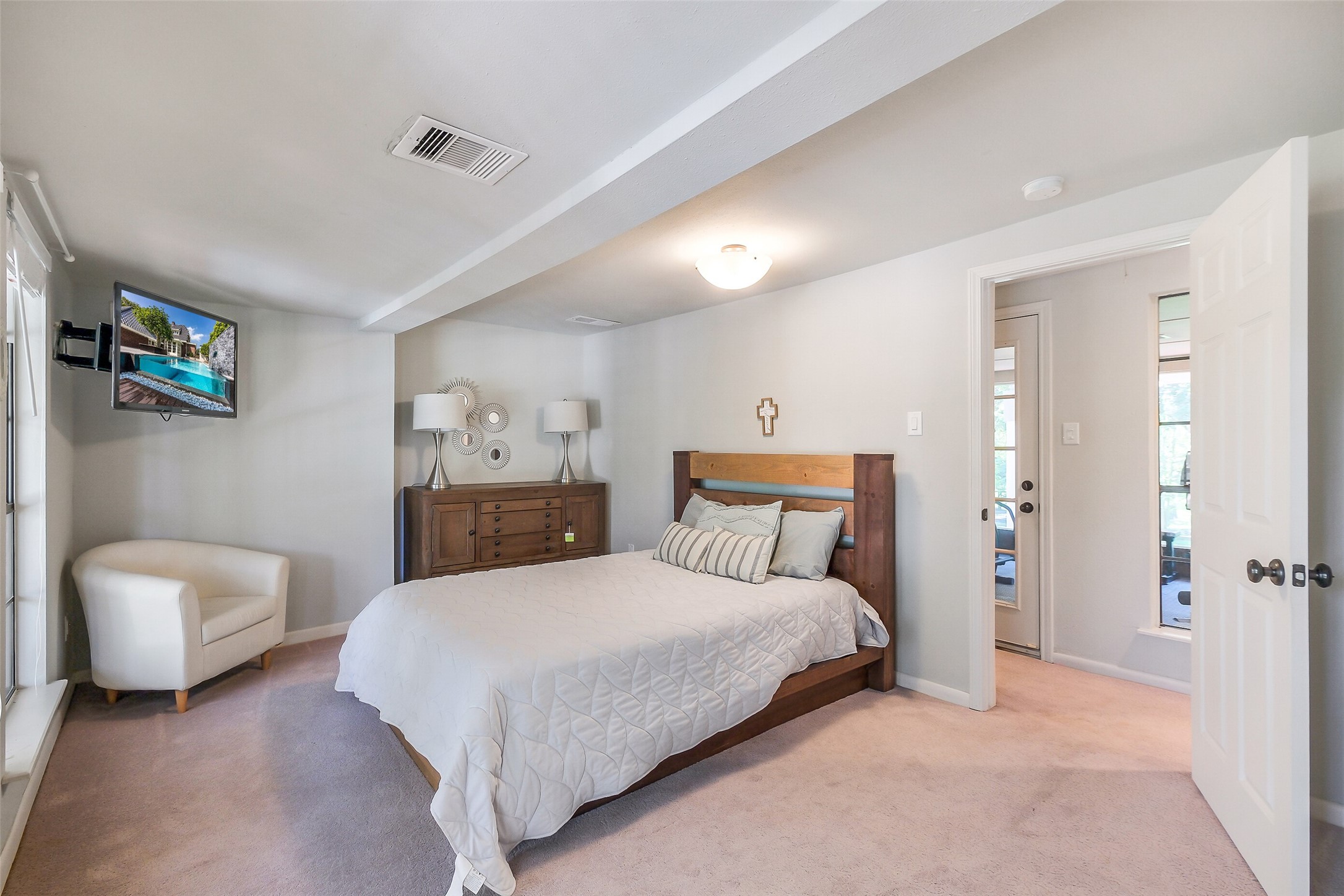 1347 Seidel Road Brookshire, TX 77423 - Photo 26 of 50 Bedroom 3. Direct access to the outside terrace that envelops the whole 2nd floor.