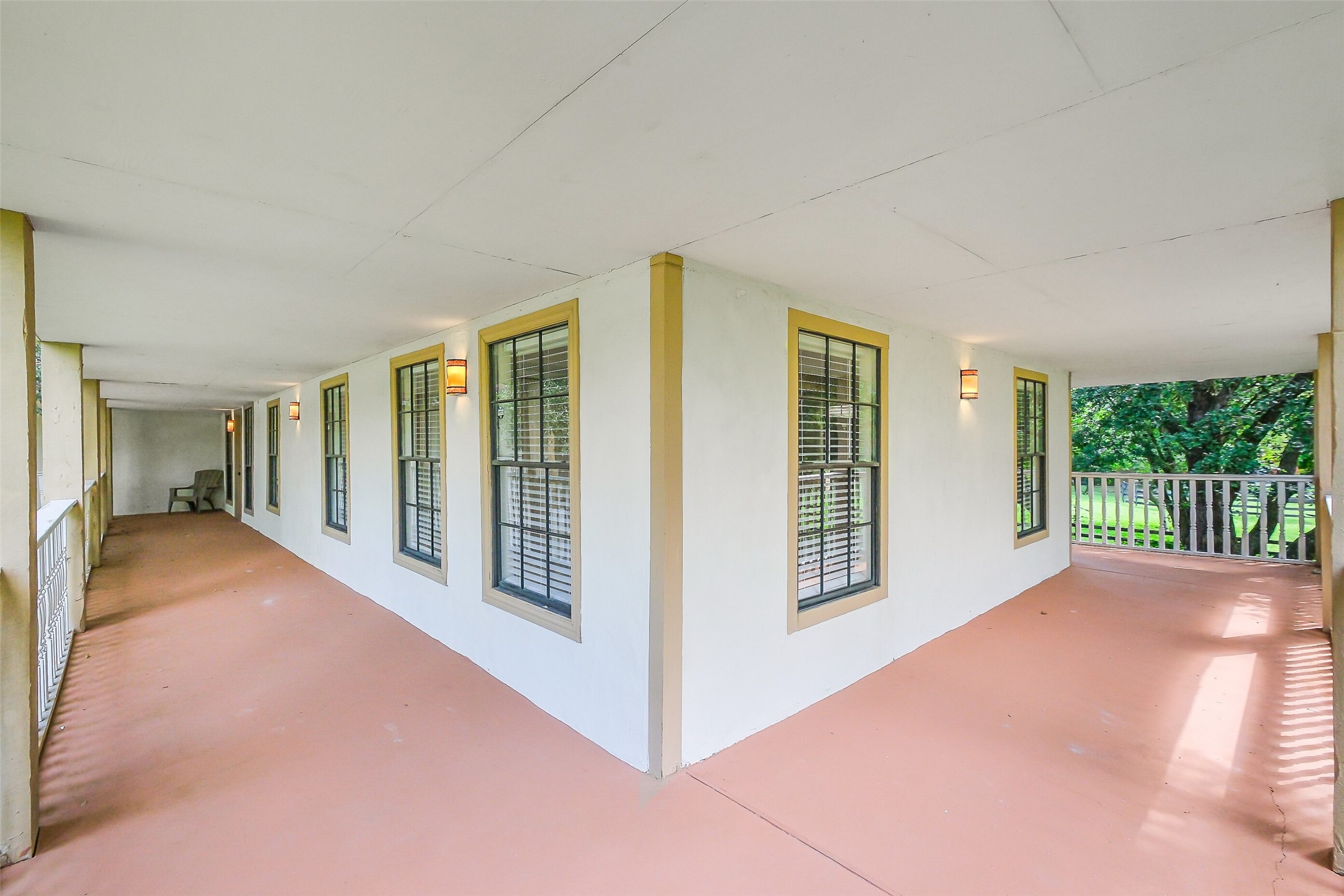 1347 Seidel Road Brookshire, TX 77423 - Photo 31 of 50 The 2nd floor enjoys this wrap around terrace around the entire floor.
