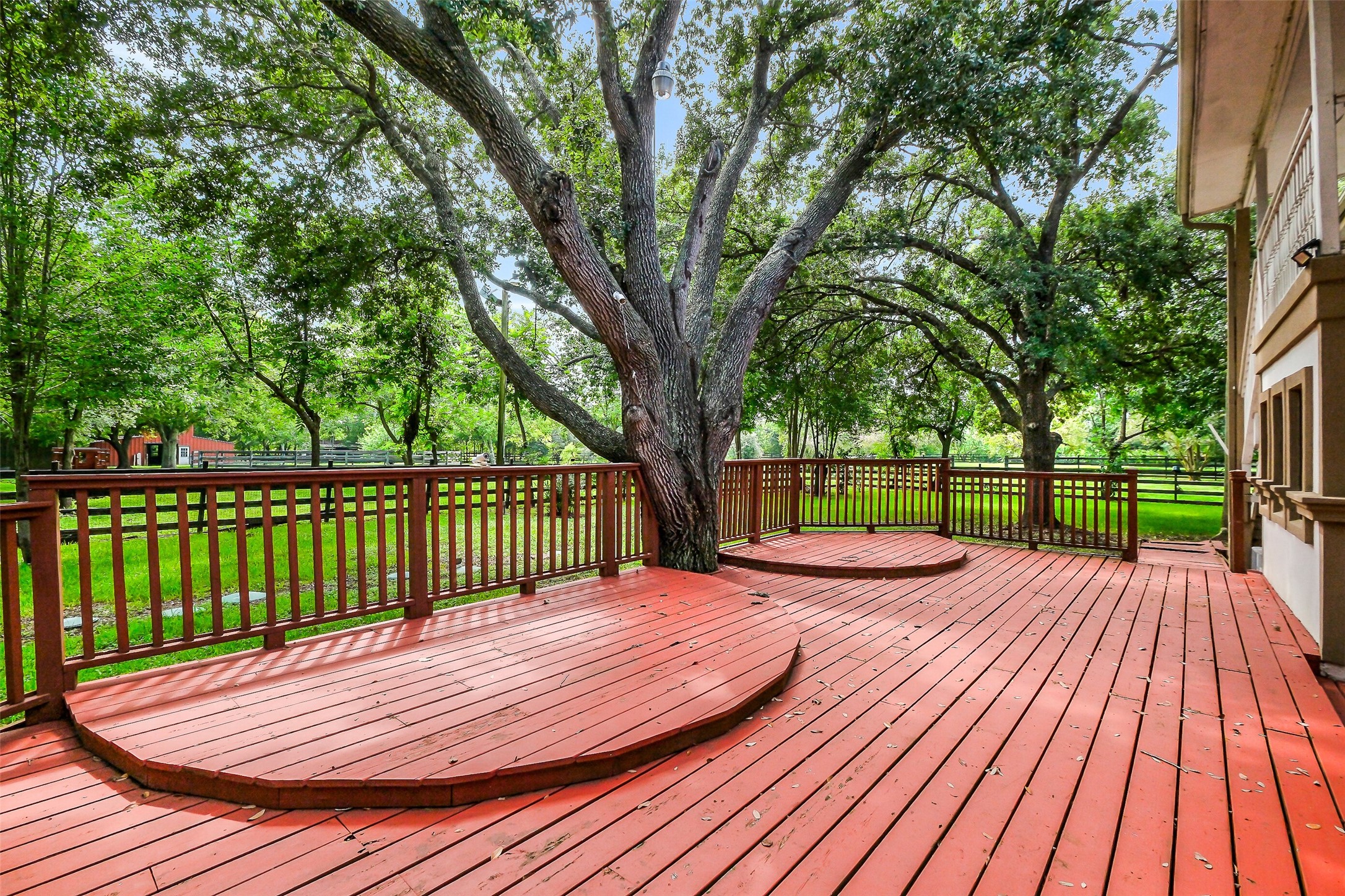 1347 Seidel Road Brookshire, TX 77423 - Photo 39 of 50 This seating area on the other side of the home from the pool gives breathtaking views of the lake and stables.