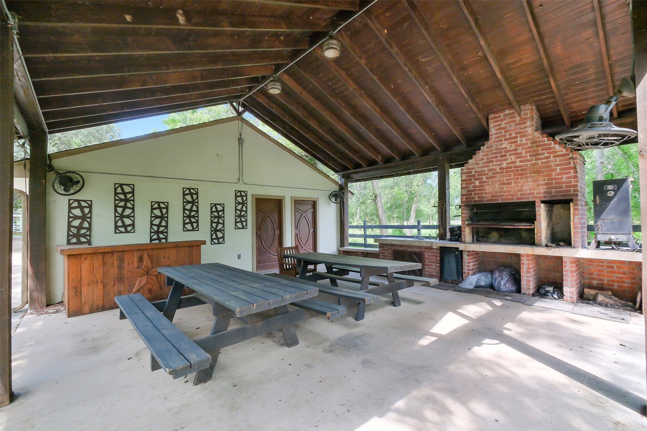 1347 Seidel Road Brookshire, TX 77423 - Photo 41 of 50 Adjacent to the garage is this picnic area with a grill, restroom and ample storage.