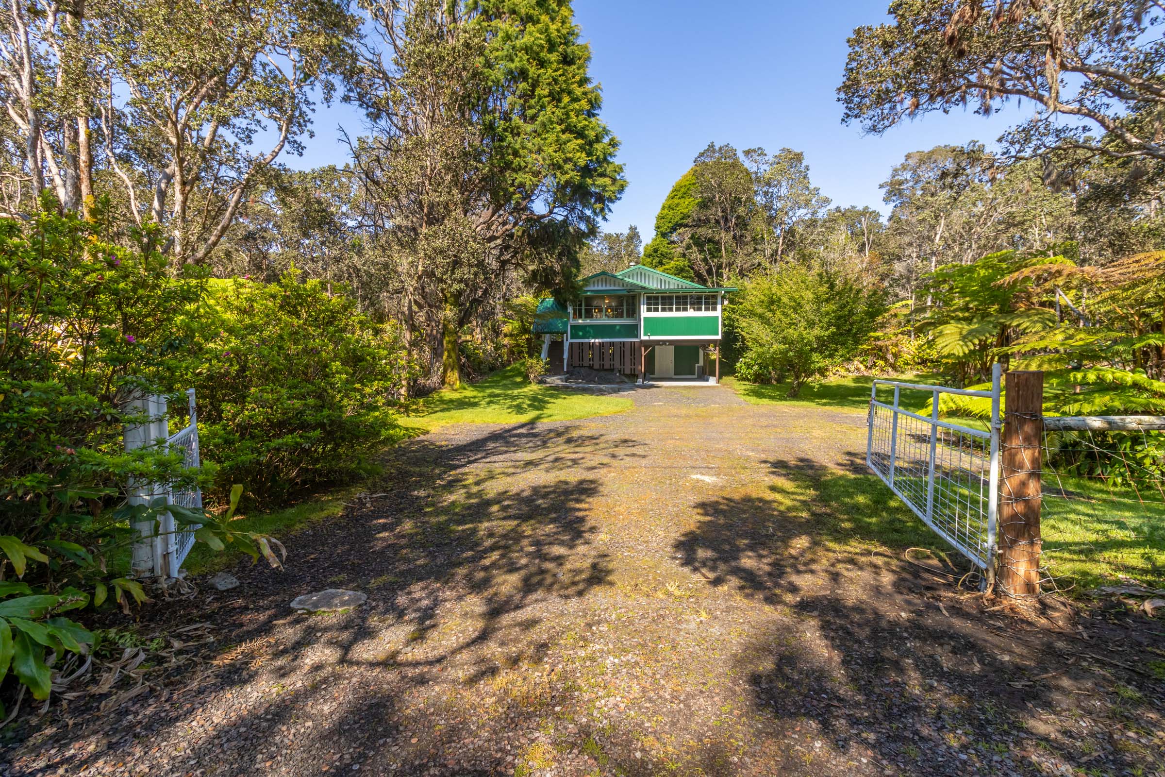 19-4035 Wright Road Volcano, HI 96785 - Photo 12 of 25 a view of a house with a yard