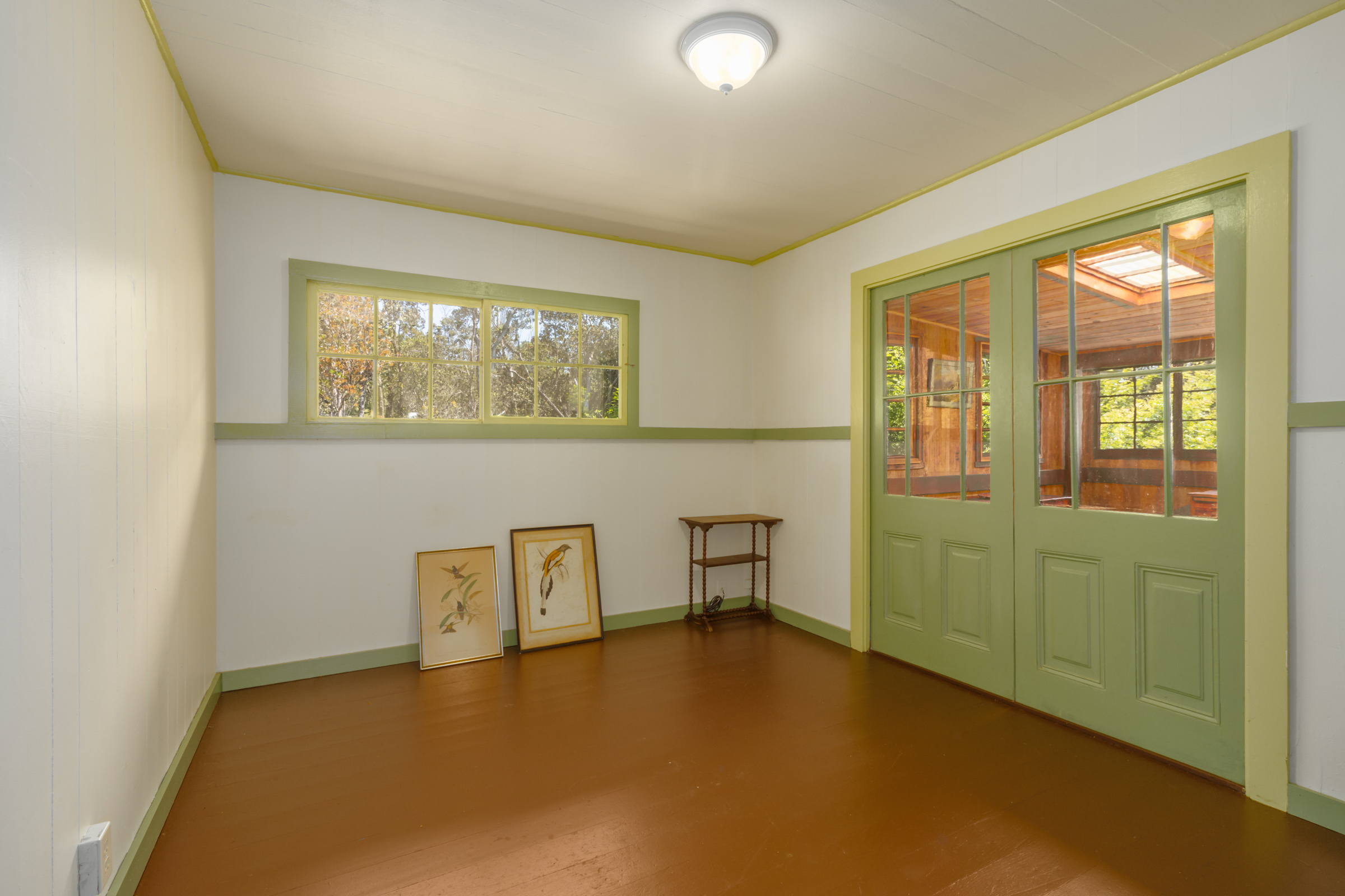 19-4035 Wright Road Volcano, HI 96785 - Photo 23 of 25 a view of a livingroom with furniture and windows