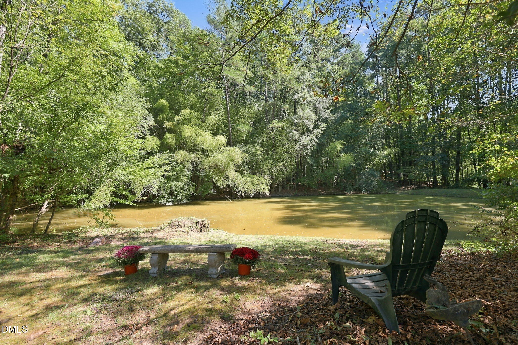 6102 Castlebrook Drive Raleigh, NC 27604 - Photo 54 of 63 The day of pictures the dam had released some water, thus the color.