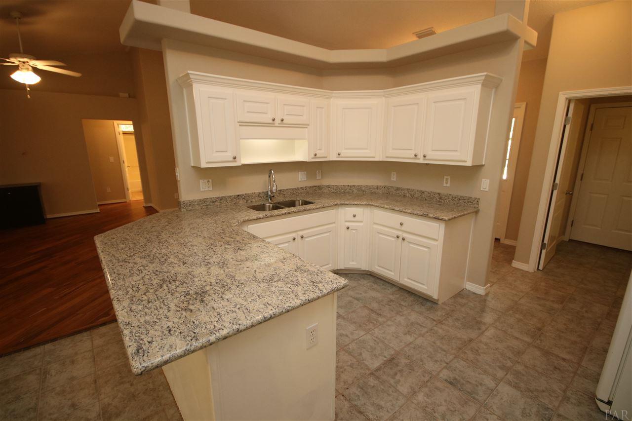 4722 Ridge Pointe Drive Pace, FL 32571 - Photo 15 of 50 ceiling for an even more open feel.