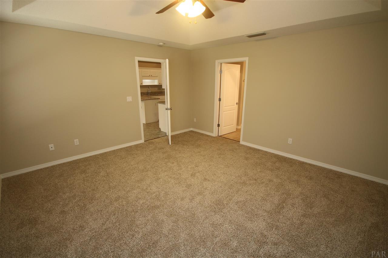 4722 Ridge Pointe Drive Pace, FL 32571 - Photo 21 of 50 ceiling & ceiling fan with light.