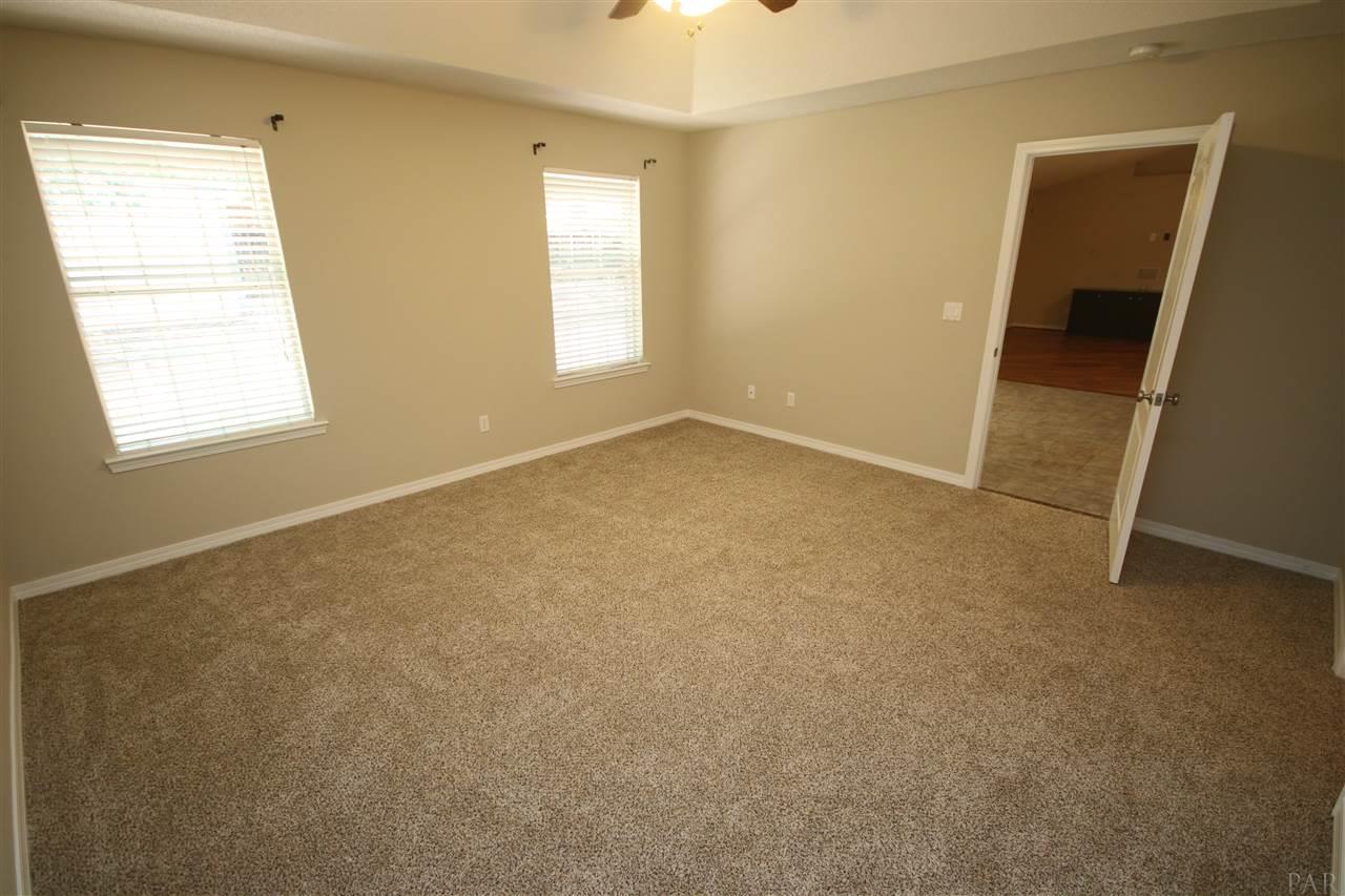 4722 Ridge Pointe Drive Pace, FL 32571 - Photo 22 of 50 Door leads into the kitchen.