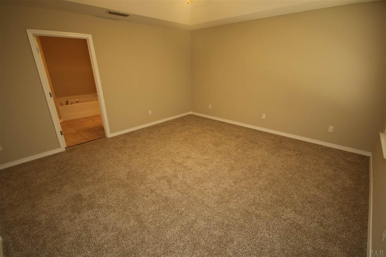 4722 Ridge Pointe Drive Pace, FL 32571 - Photo 23 of 50 of wall space for king bed & dresser.