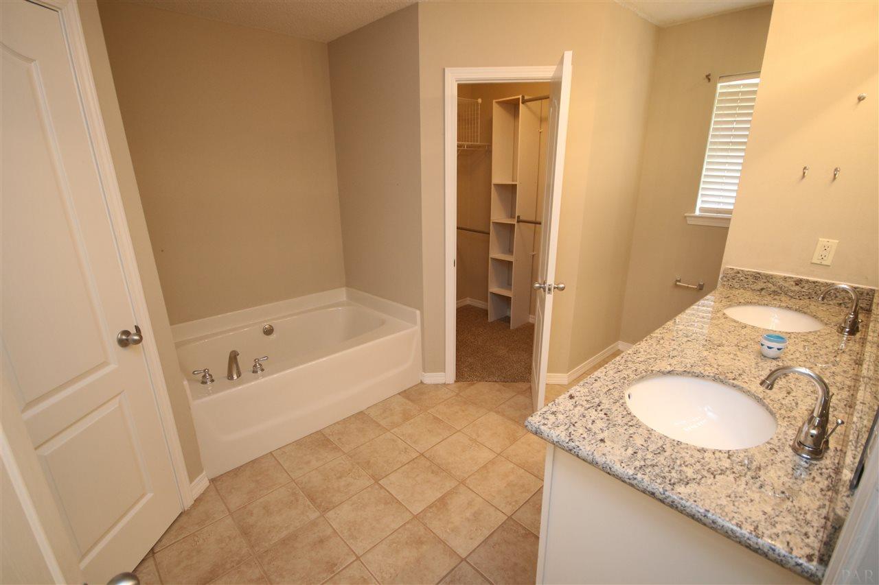 4722 Ridge Pointe Drive Pace, FL 32571 - Photo 24 of 50 walk-in closets.