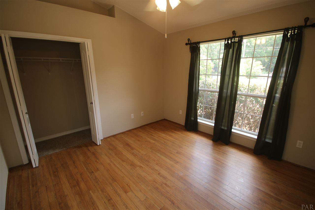 4722 Ridge Pointe Drive Pace, FL 32571 - Photo 29 of 50 of the home w/ Bamboo flooring & vaulted ceiling.