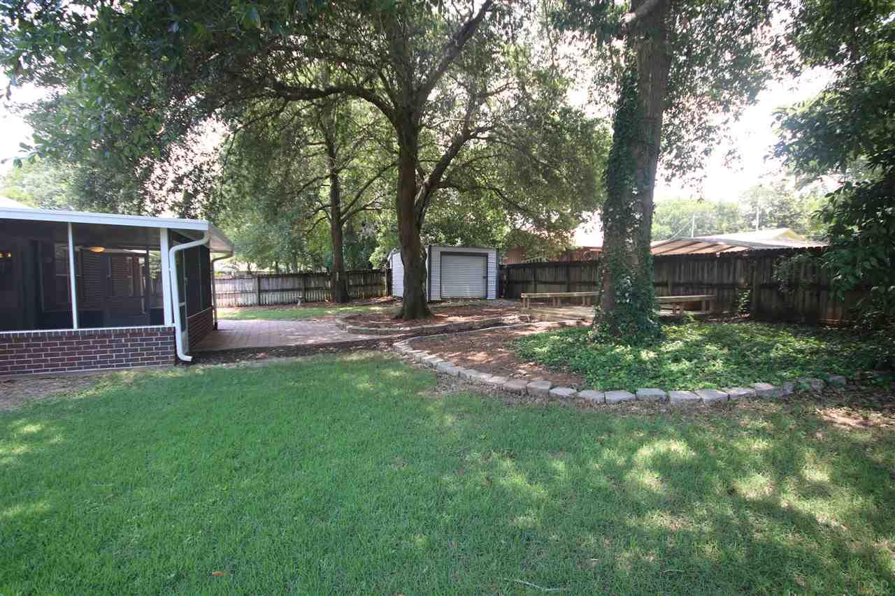 4722 Ridge Pointe Drive Pace, FL 32571 - Photo 4 of 50 beds around the shade trees for your shade plants!