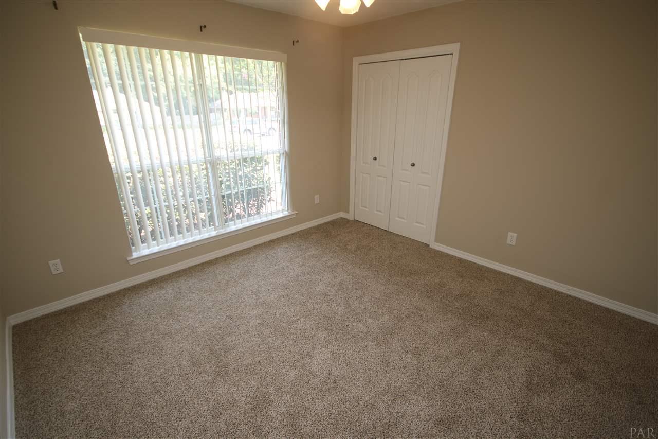 4722 Ridge Pointe Drive Pace, FL 32571 - Photo 34 of 50 Door to the hallway to your right.