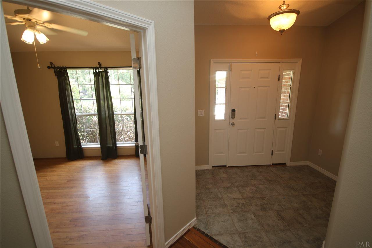 4722 Ridge Pointe Drive Pace, FL 32571 - Photo 5 of 50 the 4th bedroom to the left.