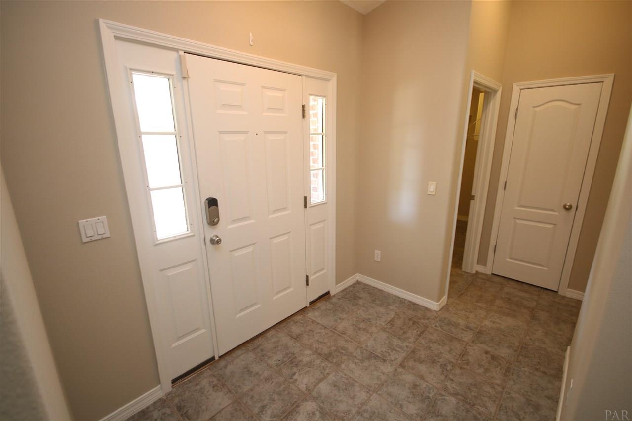 4722 Ridge Pointe Drive Pace, FL 32571 - Photo 6 of 50 Laundry room around the corner to the left.