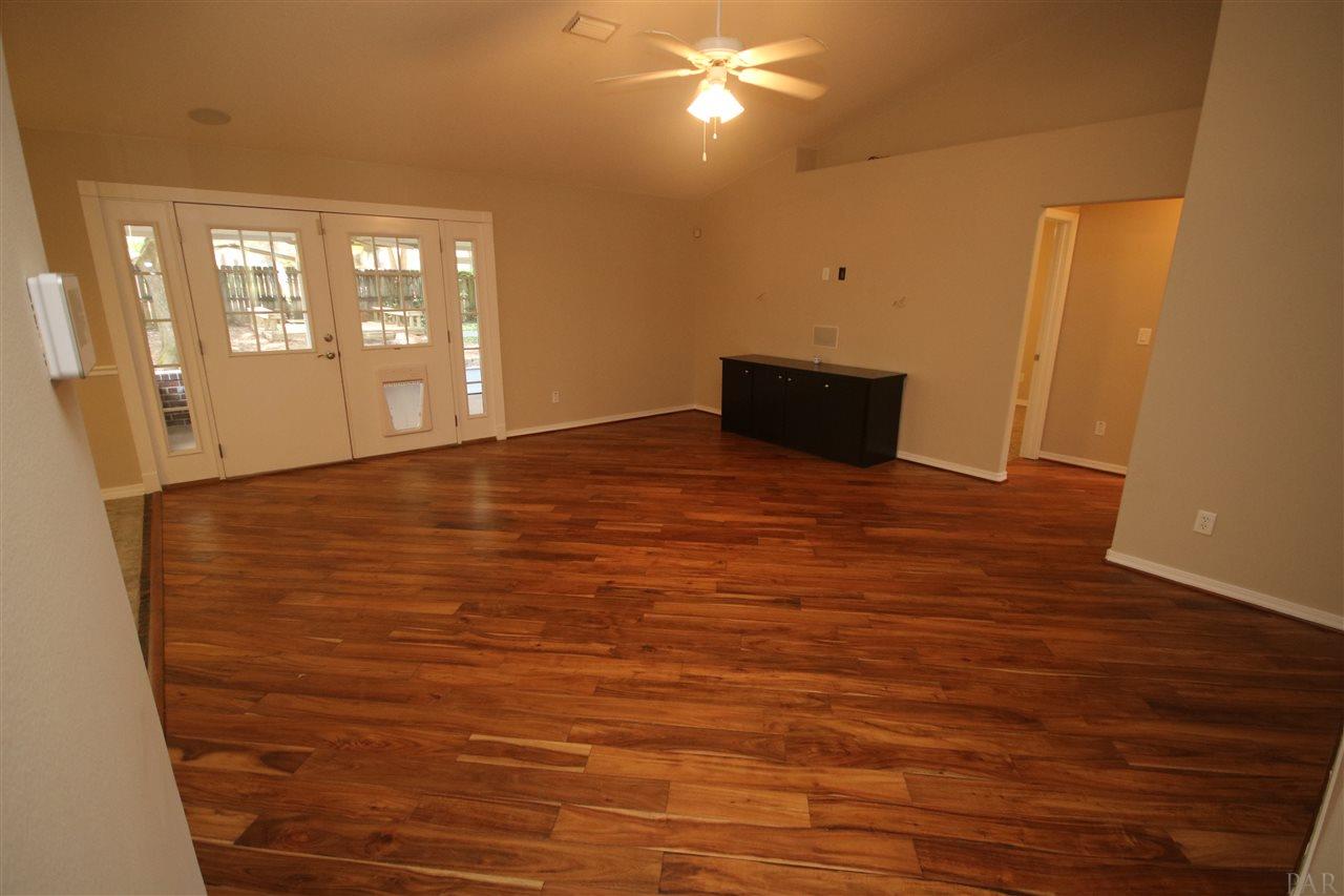 4722 Ridge Pointe Drive Pace, FL 32571 - Photo 7 of 50 June 2019. Family room w/Bamboo wood flooring.