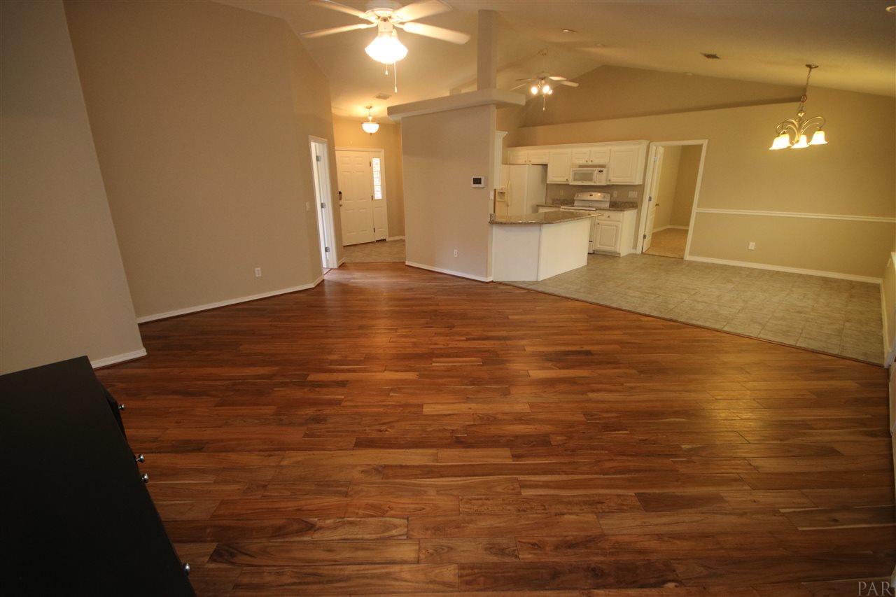 4722 Ridge Pointe Drive Pace, FL 32571 - Photo 9 of 50 the family room & kitchen.